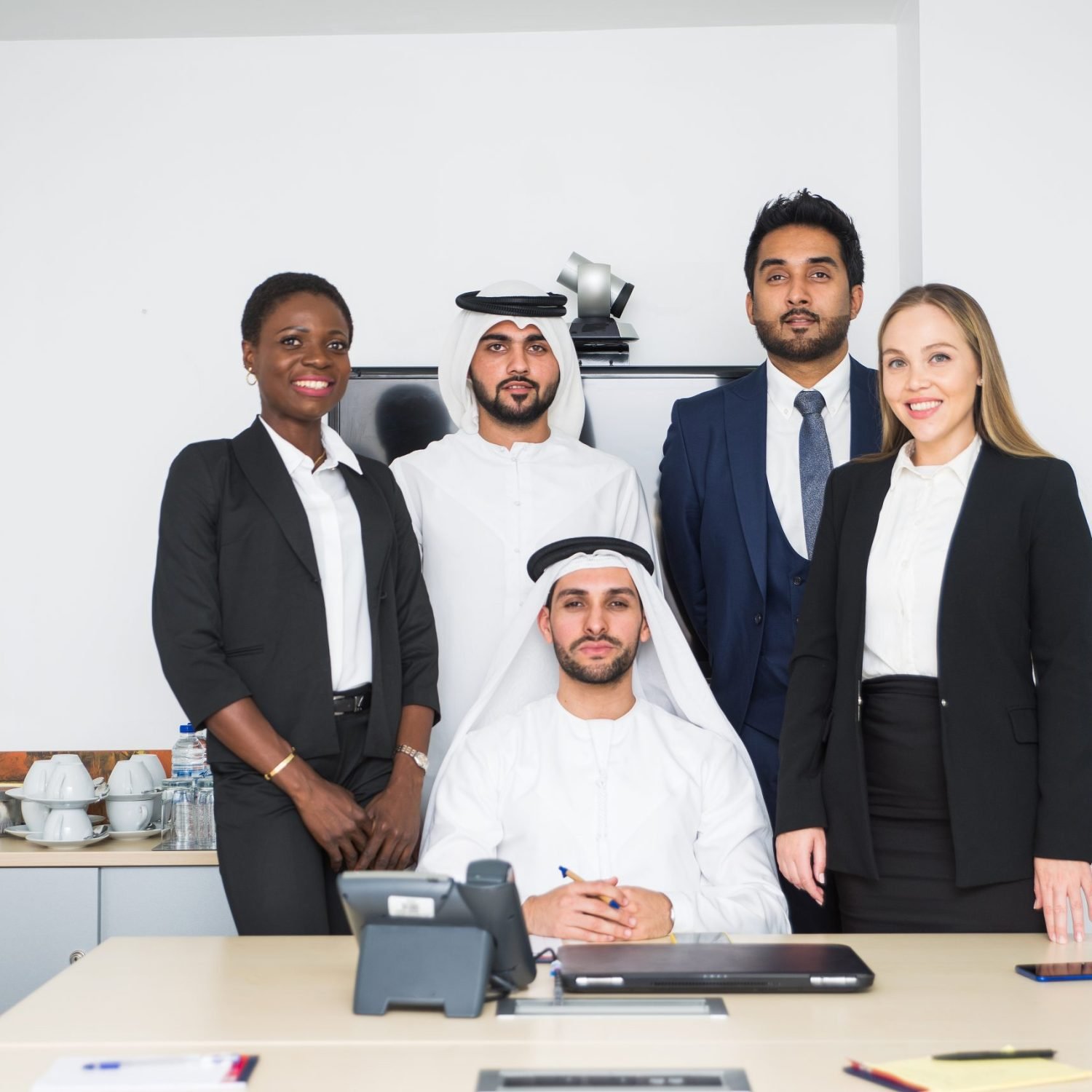 Multiracial group of business people having a meeting in a office - Teamwork in the office, business meeting in the UAE